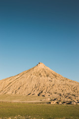 View of alone mountain in the steppe