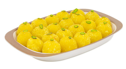 Indian Traditional Yellow Sweet Food Coconut Laddoo Also Know As Coconut Laddu, Ladoo, laddo Are Ball-Shaped Sweets. Isolated on White Background