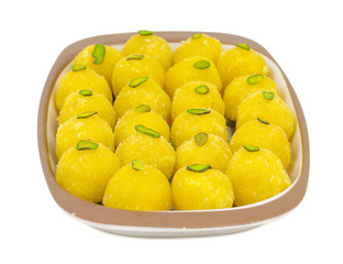 Indian Traditional Yellow Sweet Food Coconut Laddoo Also Know As Coconut Laddu, Ladoo, laddo Are Ball-Shaped Sweets. Isolated on White Background