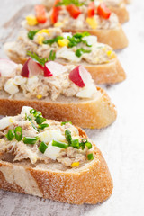 Sandwiches or baguette with mackerel or tuna fish paste, healthy nutrition
