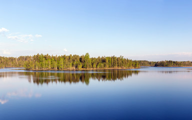 island on a forest lake