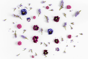 Flowers composition. Pattern made of colorful flowers on white background. Flat lay, top view