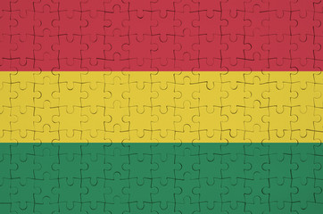 Bolivia flag  is depicted on a folded puzzle