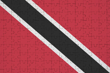 Trinidad and Tobago flag  is depicted on a folded puzzle