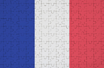 France flag  is depicted on a folded puzzle