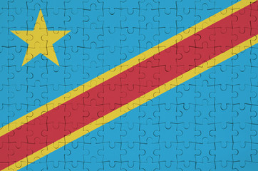 Democratic Republic of the Congo flag  is depicted on a folded puzzle