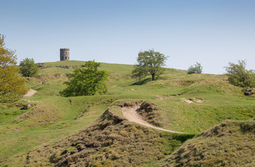 Rocky hills with Solomons Temple or Grinlow Tower in Buxton, Derbyshire Peak District