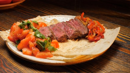 Sliced meat steak with vegetables