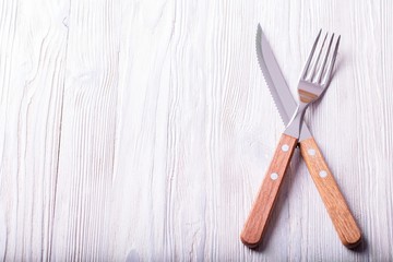Crossed knife and fork.