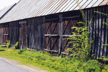 Old wooden barn in small village of Masovian Voivodeship in Poland