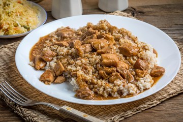 Barley groats with stewed meat.