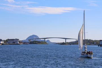 Sailboat arrives at the Bronnoysund port in Northern Norway