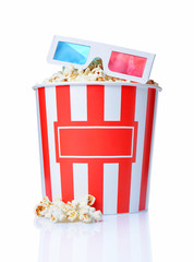 Naklejka premium Large bucket of appetizing salty popcorn with 3d anaglyph glasses
