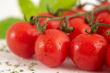 Fresh cherry tomatoes with basil
