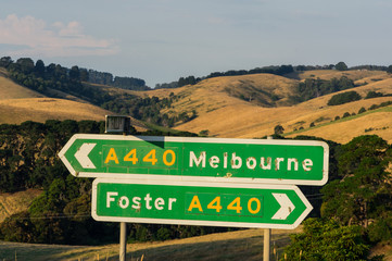 Road signs pointing towards Foster and Melbourne in South Gippsland.