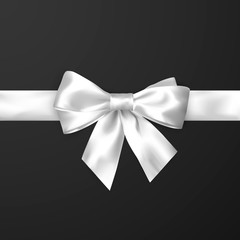 Elegance white satin bow with ribbon. Vector illustration isolated on dark background