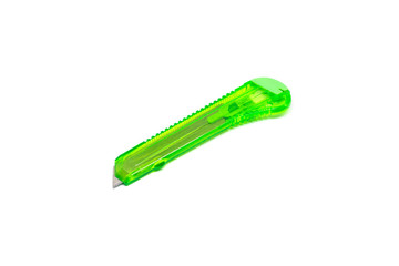 Green paper cutter knife isolated on white background