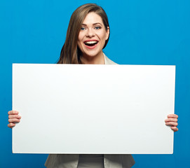 Positive emotional woman holding white banner.