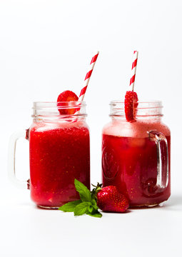 Strawberry smoothie in the jar isolated