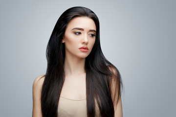 Obraz na płótnie Canvas Brunette asian girl with long straight hair