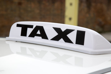 White Taxi Sign