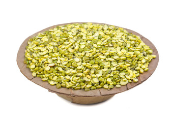 Raw Split Mung Bean Lentils or Mung Daal isolated on White Background