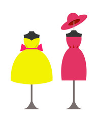 Mannequins in Modern Fashionable Dresses with Hat