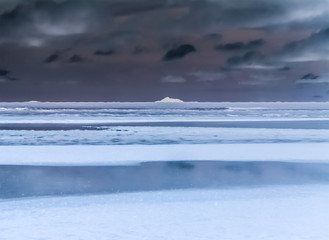 Naklejka na ściany i meble Arctic icy lands at night with icebergs