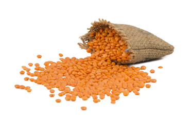 Red Lentils or Masoor Dal in a Bag isolated on White Background
