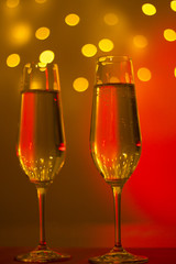 Champagne glasses in disco party bar