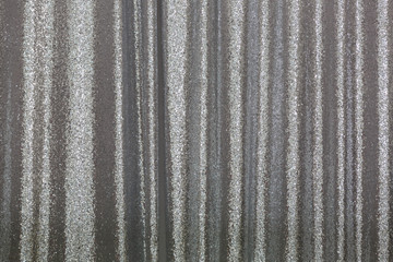 Glittery bright shimmering background perfect as a silver backdrop