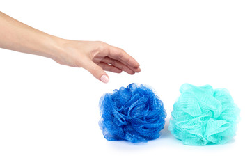 Blue bath sponge with hand isolated on white background