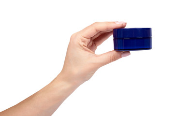 Clean cream bottle with hand isolated on white background