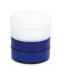 Clean cream bottle isolated on white background