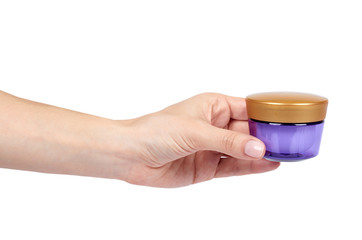 Clean cream bottle with hand isolated on white background