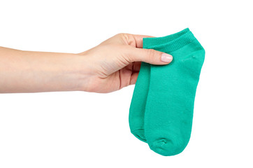 Cotton kid sock with hand isolated on white background