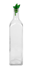 Empty transparent glass oil dispenser isolated on white background