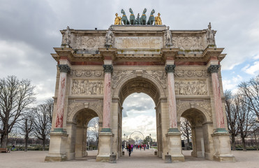 Fototapeta na wymiar Triumphal Arch (Arc de Triomphe du Carrousel) at Tuileries gardens in Paris, France