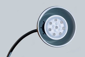 lamp lantern shines close-up LED flashlight white background round black new technology plafond shade table