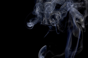 Make smoke from incense.  Black background