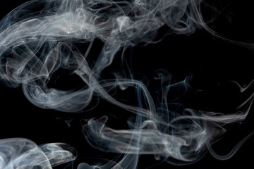 Make smoke from incense.  Black background