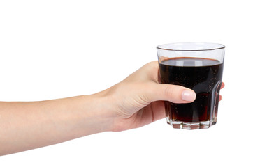 Cola drink in glass with hand isolated on white background