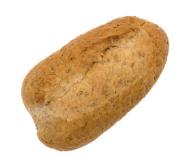 Top view of a small whole wheat bread loaf isolated on a white background.