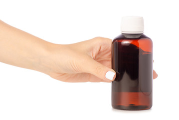 Plastic bottle of medicine bottle in hand on white background isolation