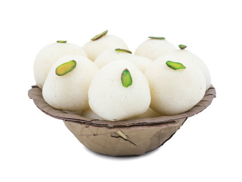 Indian Sweet Rasgulla Also Know as Rosogolla, Roshogolla, Rasagola, Ras Gulla, Anguri Rasgulla or Angoori Rasgulla is a Syrupy Dessert Popular in India. It is Made From Ball Shaped Dumplings.