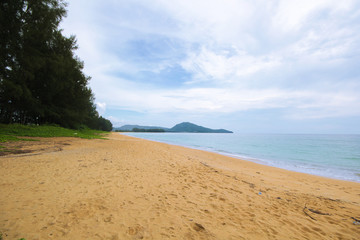 Soft wave of blue ocean on sandy beach. Background.