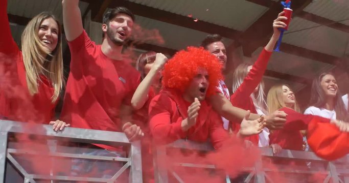 Group of soccer fans at the arena