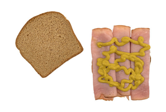 Virginia Ham Open Face Sandwich On Wheat Bread With Mustard Isolated On A White Background.