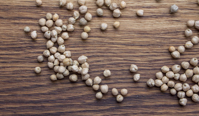 raw organic chickpeas in a wooden plate Natural organic bean