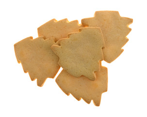 Top view of a group of tree shaped Christmas cookies isolated on a white background.